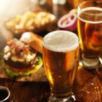 Beer,and,burgers,on,wooden,table