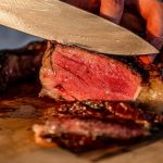Dryaged,raw,tomahawk,steak,on,wooden,background,with,vegetables,for